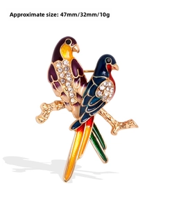 Detail view of colorful enamel parrot brooch with dimensions 47mm x 32mm and 10g weight