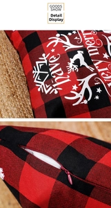 Detail of red buffalo plaid Christmas pillowcase showing merry text and hidden zipper