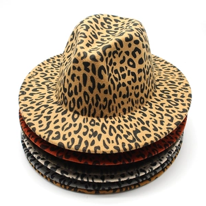 Detailed stack of leopard print fedora hats in various colors with classic wide brims