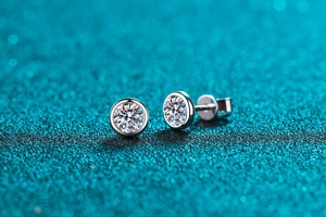 Macro shot of S925 sterling silver bubble stud earrings with sparkling moissanite stones