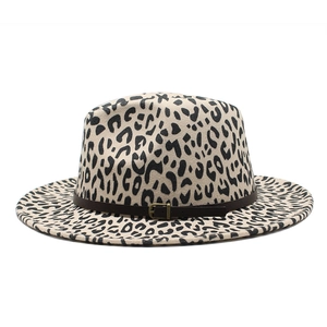 Detail of leopard print wool fedora hat with faux leather band and gold metal buckle