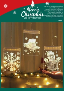 Detailed view of warm white LED acrylic Christmas hanging lights with snowflake and bell patterns