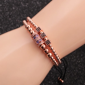Rose gold beaded bracelet set with micro-inlaid purple cubic zirconia on a wrist model