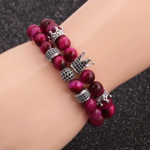 Tiger eye stone crown beaded bracelet set for men with rose red stones on model arm