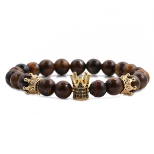 8mm yellow tiger eye stone bead bracelet set with golden crown accent on white background