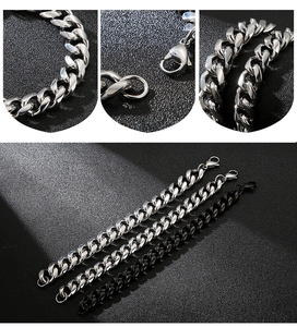 Detail view of Cuban chain bracelets in silver, gunmetal, and black stainless steel