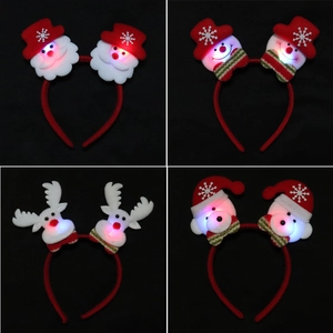 LED Christmas headbands featuring Santa, snowman and reindeer designs in plush fabric