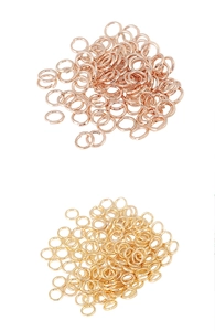 Detail of rose gold and light gold jump rings for DIY jewelry making and connection
