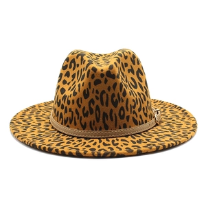 Detail of leopard print wool jazz hat with a brown leather decorative buckle band