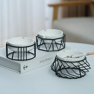 Nordic ceramic ashtray set with black geometric metal stands for modern home decor