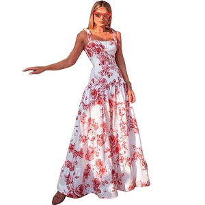 White sleeveless maxi dress with red floral print and tiered ruffle skirt for beach summer