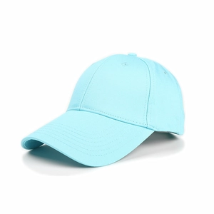 Close-up of light blue cotton baseball cap showing curved brim and six-panel stitching detail