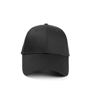 Close-up of black cotton baseball cap showing structured crown and curved brim stitching