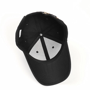 Detail view of cotton baseball cap interior structure with adjustable metal buckle