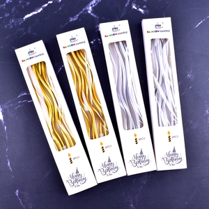 Golden and silver curved spiral birthday candles 6pcs per box on black marble base