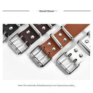 Detail of four multi-color leather belts with double-row star eyelets and zinc alloy buckles