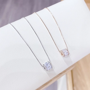 Elegant cylinder pendant necklace with micro-set zircon in silver and rose gold finishes