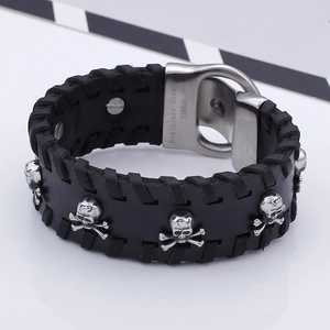 Wide black leather punk bracelet featuring skull rivets and 316L stainless steel clasp