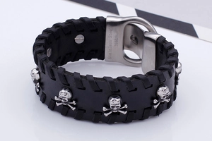 Detail of punk leather bracelet showing skull rivets and 316L stainless steel buckle