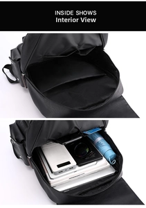 Detail view of large capacity PU leather backpack interior with laptop and accessory pockets
