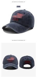 Detail view of washed navy blue baseball cap with USA embroidery and adjustable metal buckle