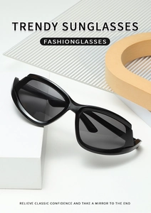 Detail of trendy Y2K black notch semi-rimless sunglasses with sleek polished frames