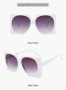 Detail of square white sunglasses with grey gradient lenses and durable metal hinges
