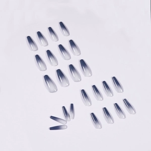 Long ballerina press-on nails with deep blue to white ombre gradient and glossy finish