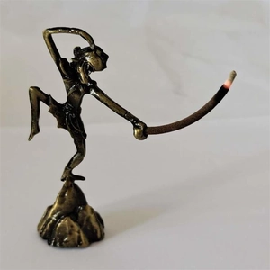 Monkey King incense holder in brass finish featuring Monkey King holding a stick incense