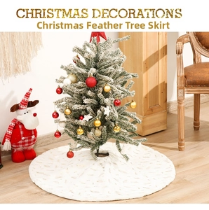 Detail of white faux rabbit fur Christmas tree skirt with golden feather foil patterns