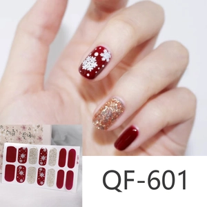 Detail of Christmas nail stickers QF-601 with red, gold glitter, and snowflake patterns