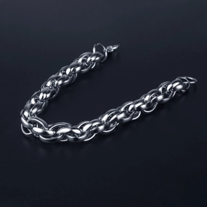Detailed view of the bold silver braided stainless steel chain link with high metallic luster