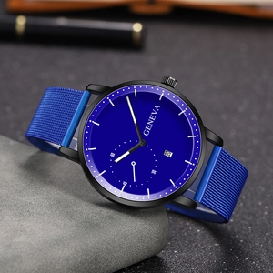 Detail view of the blue dial watch showing date window and textured mesh band