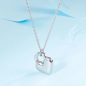 Minimalist silver heart pendant necklace with delicate cross chain for women