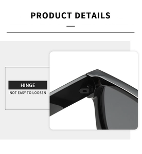 Detail view of reinforced metal hinge on black square frame sunglasses for durability
