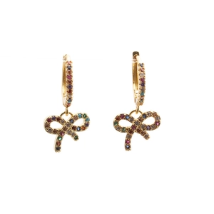 Elegant gold hoop earrings with sparkling colorful zircon butterfly pendants on white background