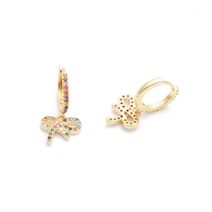 Macro detail of gold bow earrings featuring multi-color micro-pave cubic zirconia crystals