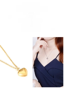 Polished heart pendant necklace with minimalist cross chain in gold and silver finish