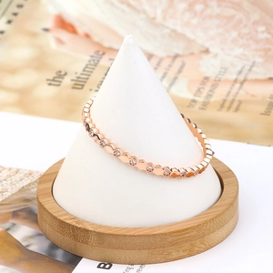 Detail view of rose gold hexagonal honeycomb bracelet with micro-paved zircon stones