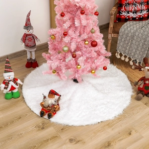 Close-up of soft white plush Christmas tree skirt with dense faux fur texture