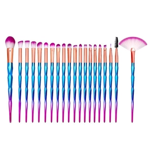 Detailed set of 20 gradient diamond handle makeup brushes with rose gold ferrules on white