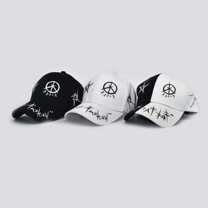 Three-color graffiti baseball caps with FASHION text in black, white, and bicolour styles