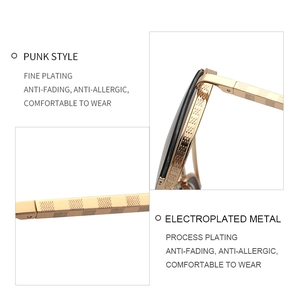 Detailed macro view of punk style bright gold sunglasses with checkered texture temples