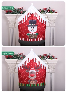 Detail of snowman and reindeer Christmas chair covers with Warm Wishes festive motifs