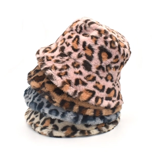 Plush leopard print bucket hats in multiple colors with warm faux fur material