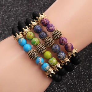 Imperial stone bead bracelet set with golden crown and micro-pave cz disco ball