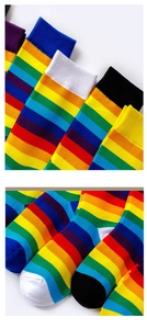 Detail showing the ribbed rainbow cuffs and vibrant toe design of cotton crew socks