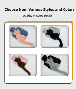 Detail of four colorful plush hot water bottles with cat ears and long tails decoration