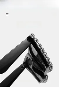 Detail of oversized black sunglasses with premium crystal insets and flexible lightweight frame