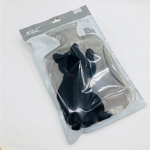 Grey plush hot water bottle with cat silhouette in retail packaging, durable PVC liner